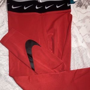 leggings. orangish pink. long.